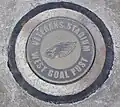 The mounting point for Veterans Stadium's west end zone goalpost, used by the Philadelphia Eagles for 32 seasons, is marked in the same parking lot (the east goalpost is similarly marked). (2011)