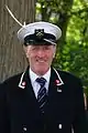 Vintners' Swan Marker, in blue uniform, during annual Swan Upping at Abingdon, summer 2011