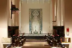 The chancel (sanctuary). The dossal hangs behind the altar.