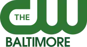 The CW network logo in green with the word "Baltimore" beneath in darker green.