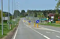 Ul. Szosa Wschodnia - National Road no. 65, crossing the village