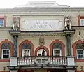 Villa Venezia's facade representing two of his sons: Osvald and Walter. In the middle a damaged statue of Albrecht Dürer is recognisable.