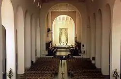 The nave. The font is placed in the centre.