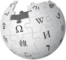 An incomplete sphere made of large, white jigsaw puzzle pieces. Each puzzle piece contains one glyph from a different writing system, with each glyph written in black.