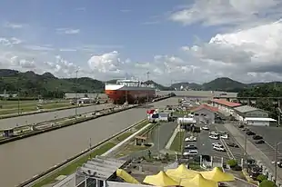 Large ship coming through a canal lock