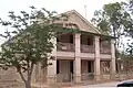 Wilcannia Police Station with Melia azedarach