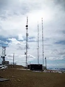 The towers for KFRZ/KZWB (farthest right) and the TV stations, including K35CN (center).