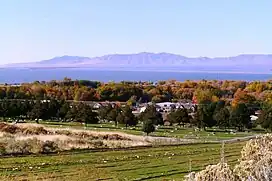 A photo of the Promontory Mountains viewed from across Willard Bay