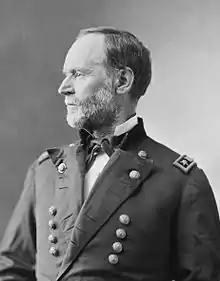 Man with light beard and facing left in uniform with two vertical columns of buttons