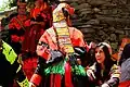 Woman wearing a traditional embroidered Kalash headdress, Pakistan.