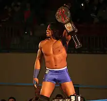 Kenny King with the 2nd design of the X-Division title.