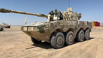 Chinese and Russian soldiers checking the ZTL-11 assault gun at Sibu/Interaction-2021 military exercises