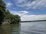 Landscape photo showing a northern view of Yellow Creek Lake from the water