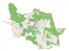 Mapa konturowa gminy Łazy, blisko centrum na lewo znajduje się punkt z opisem „Wiesiółka”