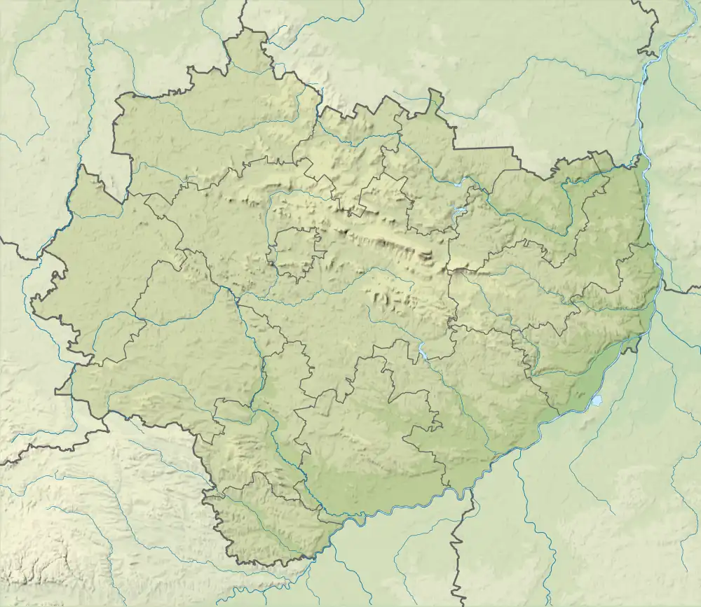 Mapa konturowa województwa świętokrzyskiego, blisko centrum u góry znajduje się punkt z opisem „miejsce bitwy”