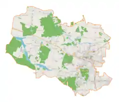 Mapa konturowa gminy Aleksandrów Łódzki, blisko centrum u góry znajduje się punkt z opisem „Bugaj”