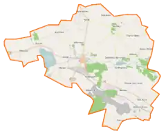 Mapa konturowa gminy Barcin, po lewej znajduje się owalna plamka nieco zaostrzona i wystająca na lewo w swoim dolnym rogu z opisem „Jezioro Wolickie”