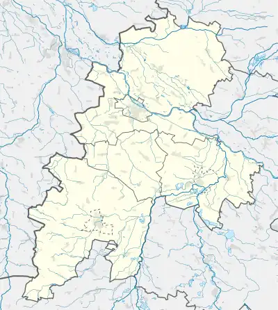 Mapa konturowa powiatu brzeskiego, na dole po lewej znajduje się punkt z opisem „Pałac w Jędrzejowie”