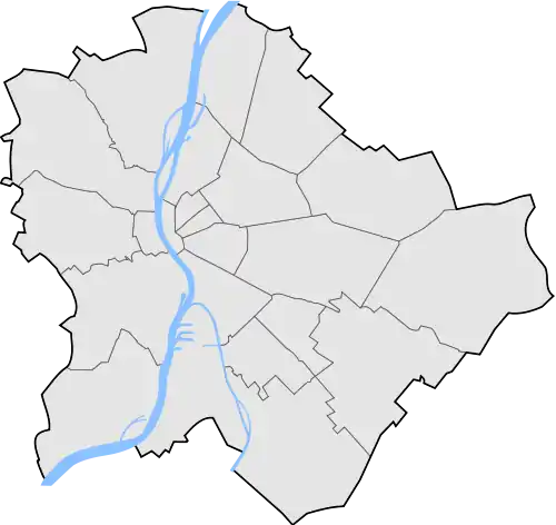 Mapa konturowa Budapesztu, blisko centrum na lewo znajduje się punkt z opisem „Uniwersytet Techniczno-Ekonomiczny w Budapeszcie”