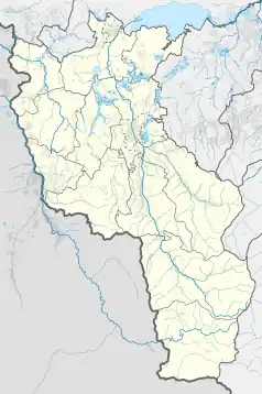 Mapa konturowa powiatu cieszyńskiego, po lewej znajduje się punkt z opisem „Macierz Ziemi Cieszyńskiej”