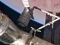 Cygnus S.S. Gordon Fullerton przyciągany do stacji przez Canadarm2