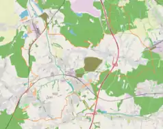 Mapa konturowa Czerwionki-Leszczyn, blisko centrum na lewo znajduje się punkt z opisem „Zamek w Czuchowie”