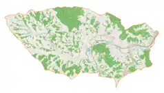 Mapa konturowa gminy Czudec, w centrum znajduje się ikonka zamku z wieżą z opisem „Zamek w Czudcu”