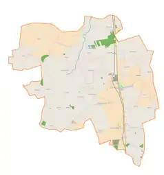 Mapa konturowa gminy Daszyna, blisko centrum u góry znajduje się punkt z opisem „Parafia św. Jana Chrzciciela”