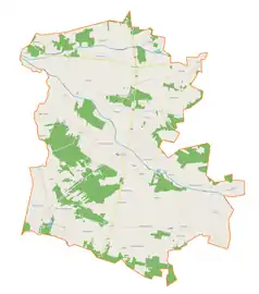 Mapa konturowa gminy Drużbice, w centrum znajduje się punkt z opisem „Drużbice-Kolonia”