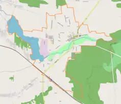 Mapa konturowa Drzewicy, blisko centrum na prawo u góry znajduje się punkt z opisem „Kościół pw. św. Łukasza w Drzewicy”