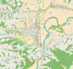 Mapa konturowa Dynowa, w centrum znajduje się punkt z opisem „Parafiaśw. Wawrzyńcaw Dynowie”