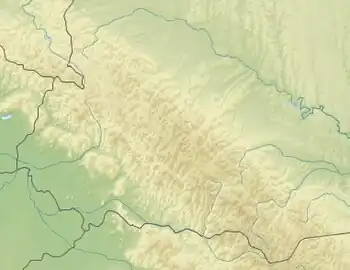 Mapa konturowa Beskidów Wschodnich, w centrum znajduje się czarny trójkącik z opisem „Owoł”