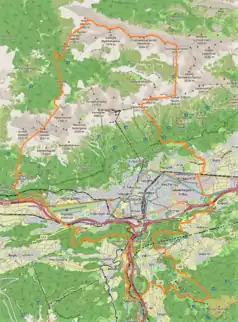 Mapa konturowa Innsbrucku, blisko centrum po prawej na dole znajduje się punkt z opisem „Innsbruck Hauptbahnhof”