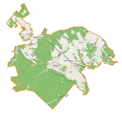 Mapa konturowa gminy Józefów, blisko centrum u góry znajduje się punkt z opisem „Józefów Roztoczański”