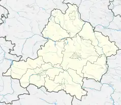 Mapa konturowa powiatu jędrzejowskiego, blisko dolnej krawiędzi nieco na prawo znajduje się punkt z opisem „Dropiówka”