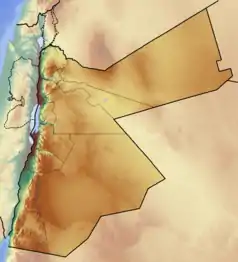 Mapa konturowa Jordanii, na dole po lewej znajduje się czarny trójkącik z opisem „Dżabal Ramm”