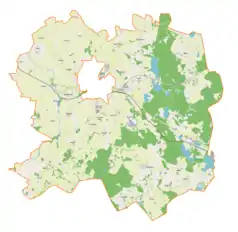 Mapa konturowa gminy wiejskiej Kętrzyn, na dole nieco na prawo znajduje się ikonka pałacu z opisem „Pałac w Nakomiadach”