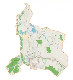 Mapa konturowa gminy Kęty, na dole znajduje się punkt z opisem „Kościół św. Jana Kantego w Kętach”