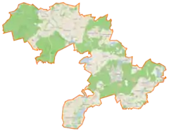 Mapa konturowa gminy Kartuzy, po prawej nieco na dole znajduje się owalna plamka nieco zaostrzona i wystająca na lewo w swoim dolnym rogu z opisem „Mezowskie Małe”