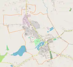 Mapa konturowa Kazimierzy Wielkiej, blisko centrum na lewo znajduje się punkt z opisem „Parafia Miłosierdzia Bożego”