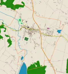 Mapa konturowa Klimontowa, blisko centrum u góry znajduje się punkt z opisem „Kościół św. Józefa w Klimontowie”