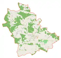 Mapa konturowa gminy Kożuchów, blisko centrum u góry znajduje się punkt z opisem „Pałac w Studzieńcu (województwo lubuskie)”