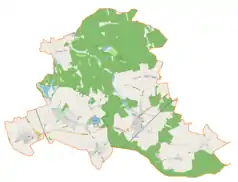 Mapa konturowa gminy Kochanowice, blisko centrum na dole znajduje się punkt z opisem „Pałac w Kochanowicach”