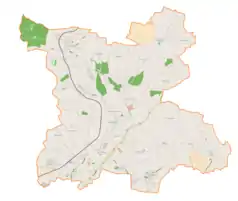 Mapa konturowa gminy Kocmyrzów-Luborzyca, na dole znajduje się punkt z opisem „Dojazdów”