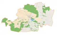 Mapa konturowa gminy Książ Wielki, na dole nieco na prawo znajduje się punkt z opisem „Giebułtów”