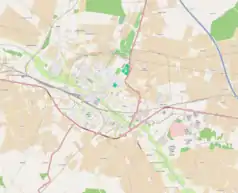 Mapa konturowa Kutna, w centrum znajduje się punkt z opisem „Wyższa Szkoła Gospodarki Krajowej w Kutnie”