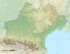 Mapa konturowa Oksytanii, u góry nieco na prawo znajduje się punkt z opisem „źródło”, poniżej na lewo znajduje się również punkt z opisem „ujście”