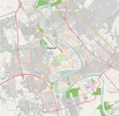 Mapa konturowa Bagdadu, na dole znajduje się punkt z opisem „Uniwersytet Bagdadzki”