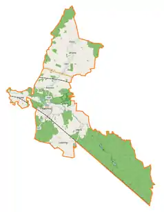 Mapa konturowa gminy Małomice, blisko centrum na lewo u góry znajduje się ikonka zamku z wieżą z opisem „Zamek graniczny Janowiec”