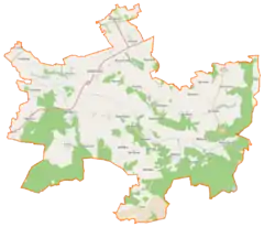 Mapa konturowa gminy Malechowo, po prawej znajduje się punkt z opisem „Parafia pw. Podwyższenia Krzyża Świętego w Ostrowcu”